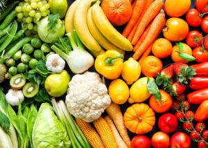 Assortment Of Fresh Organic Fruits And Vegetables In Rainbow Colors