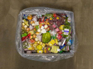 Divert bin filled with various wasted food items